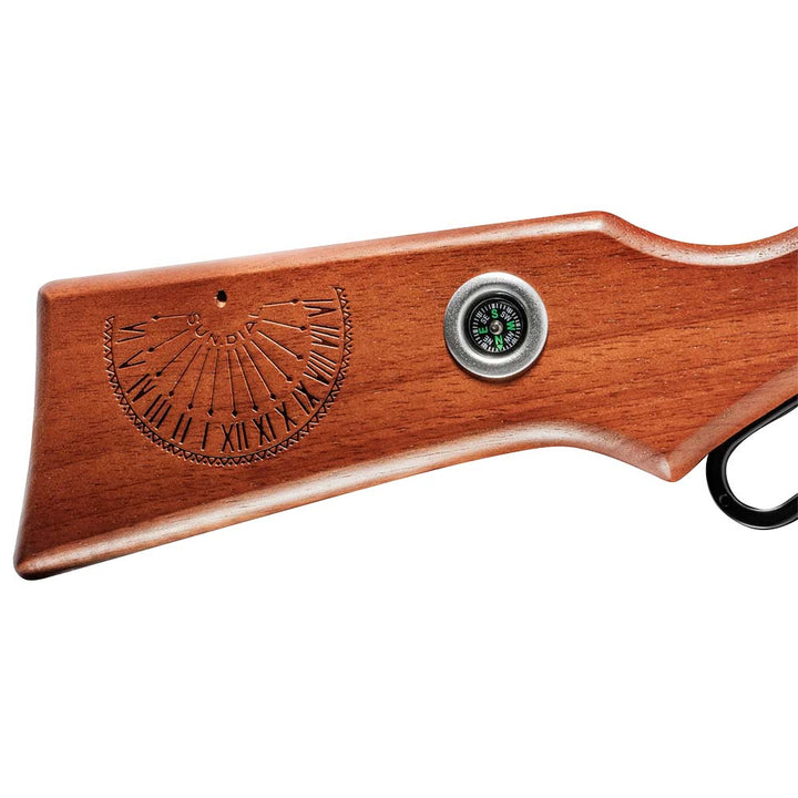 Red Ryder A Christmas Wish BB Gun by Daisy zoomed in on stock with Sundial